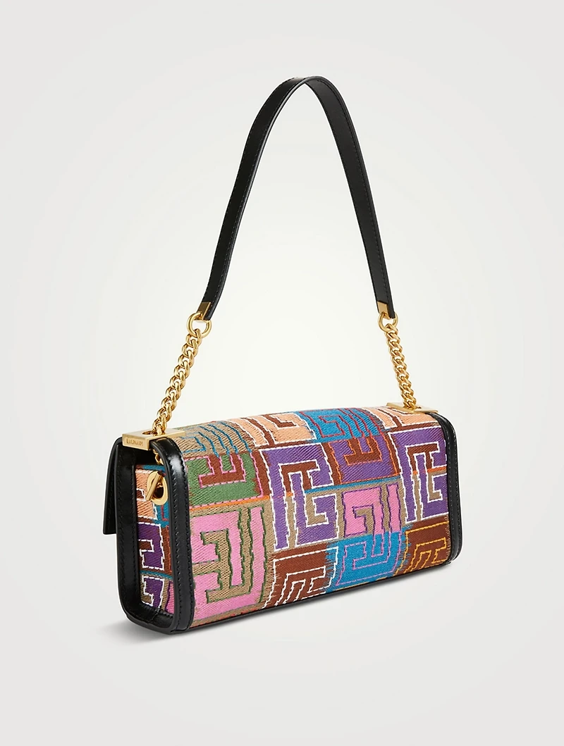 1945 Tapestry Leather Clutch