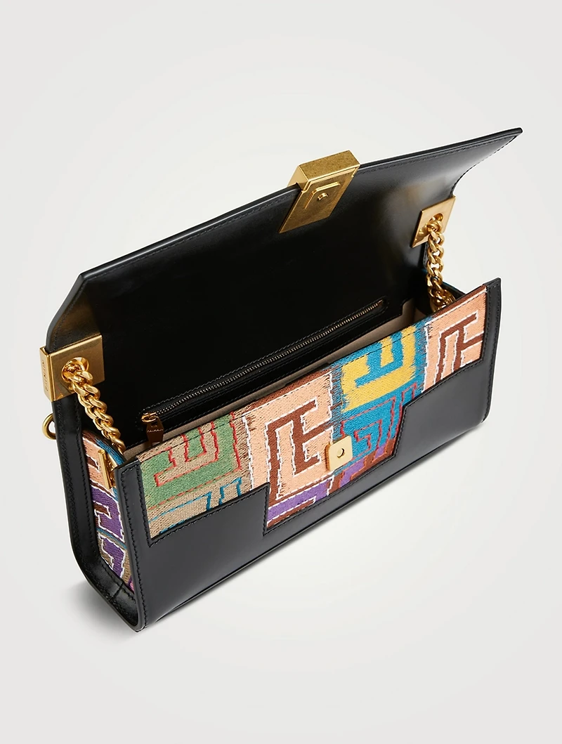 1945 Tapestry Leather Clutch