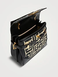 B-Buzz 23 Monogram Raffia Top Handle Bag