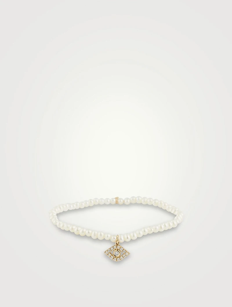 Pearl Bracelet With Large 14K Gold Diamond Evil Eye Charm