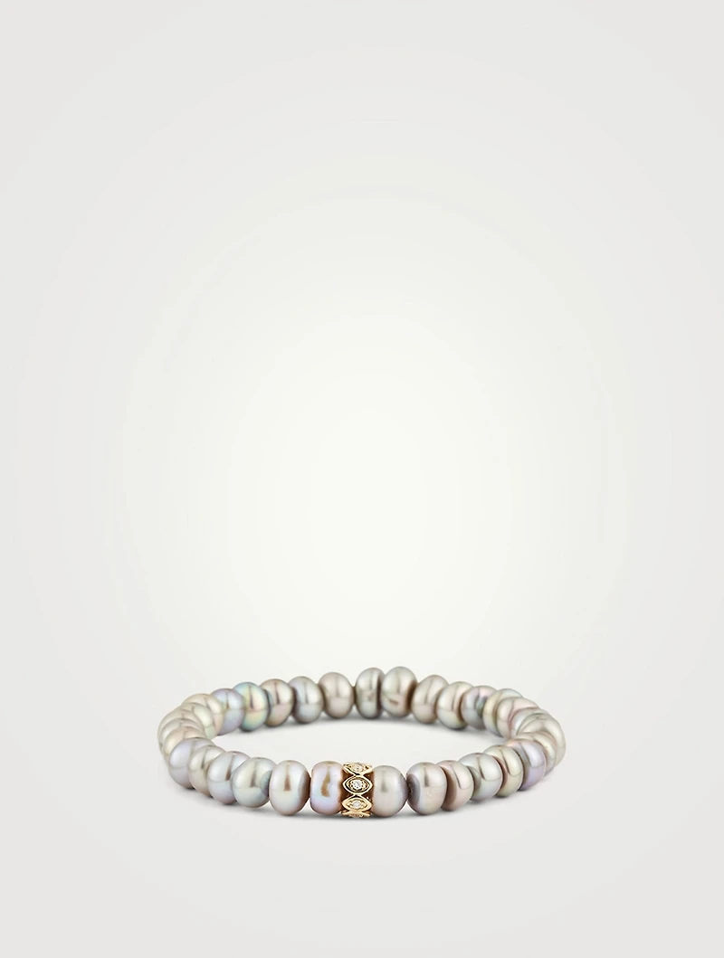 Pearl Bracelet With Large 14K Gold Evil Eye Bead