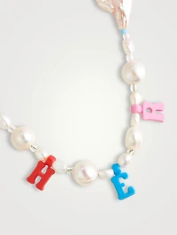 Her Necklace With Pearls