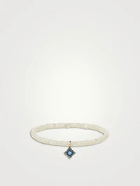 Beaded Bracelet With 14K Gold Diamond Moroccan Flower Charm