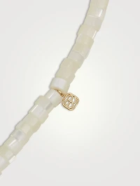 Beaded Bracelet With 14K Gold Diamond Moroccan Flower Charm