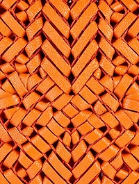The Neeson Tassel Woven Leather Clutch