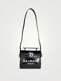 B-Buzz 23 Vinyl And Leather Top Handle Bag