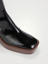 Tronchetto Leather Platform Ankle Boots