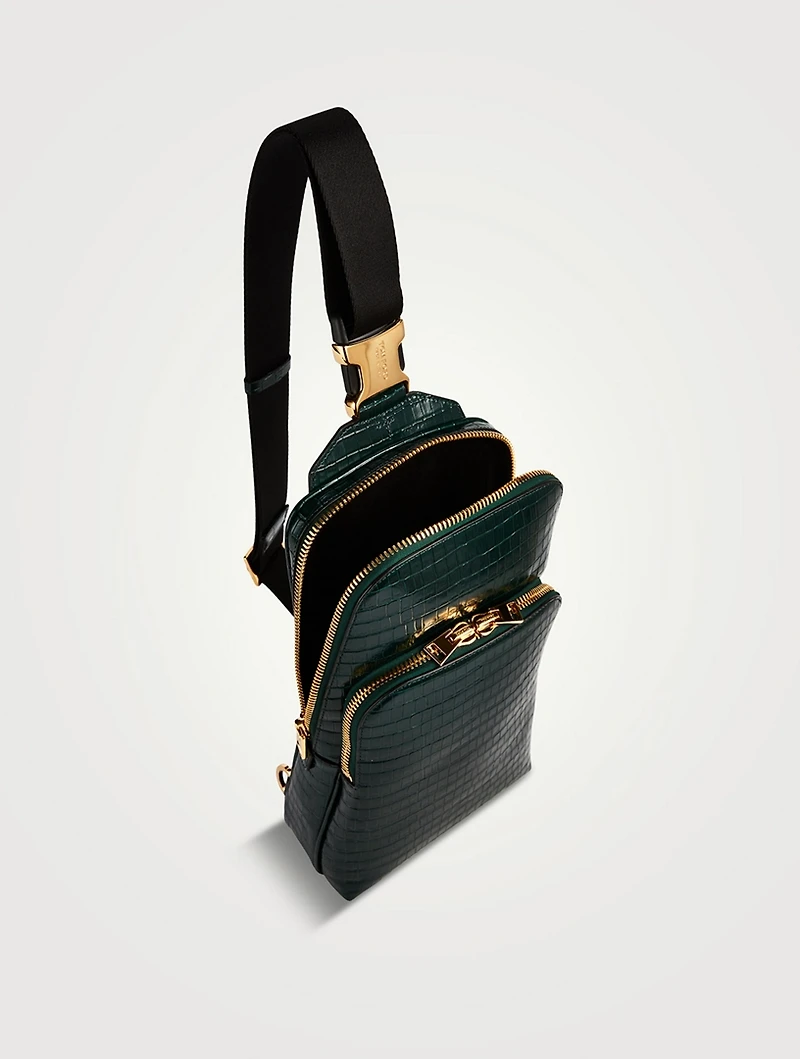 Glossy Leather Sling Backpack In Croc Print