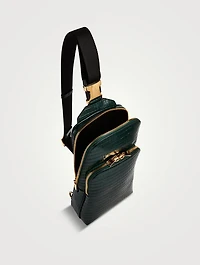 Glossy Leather Sling Backpack In Croc Print