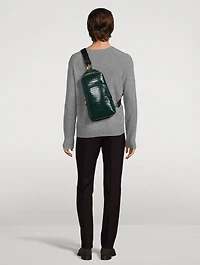 Glossy Leather Sling Backpack In Croc Print