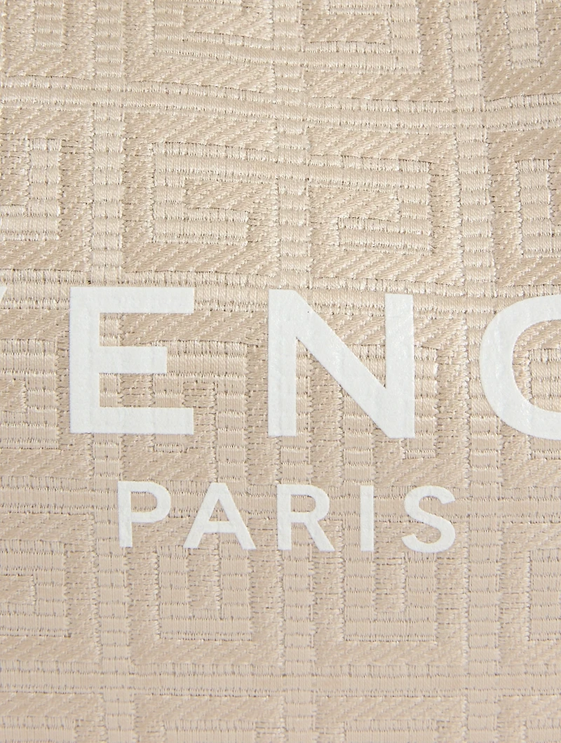 Small Moon Cut Out Embossed Coated Canvas Shoulder Bag