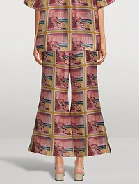Wonderland Poster Crop Flared Pants Print