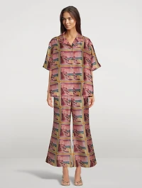Wonderland Poster Crop Flared Pants Print