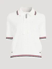 Pull à col cravate en tissu ajouré