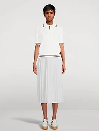 Pull à col cravate en tissu ajouré