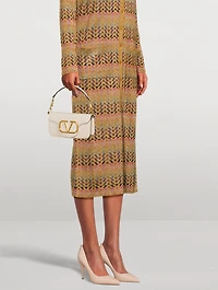 Rockstud Leather Pumps