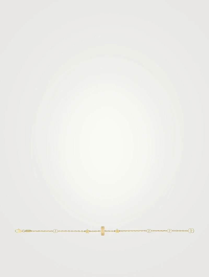 18K Gold Charm And Star Bracelet