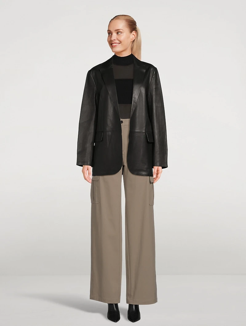 Sleeveless Sheer Turtleneck