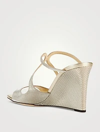 Anise Embossed Metallic Wedge Mules