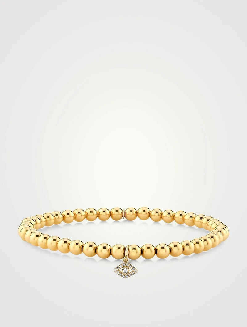 Beaded Bracelet With 14K Gold Tiny Diamond Bezel Evil Eye Charm