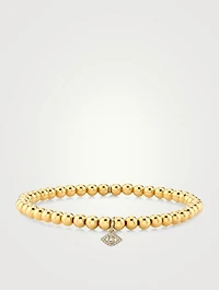 Beaded Bracelet With 14K Gold Tiny Diamond Bezel Evil Eye Charm