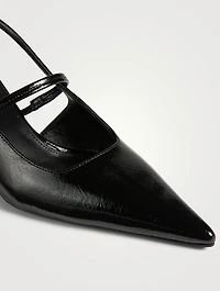 The Sharp Patent Leather Slingback Pumps