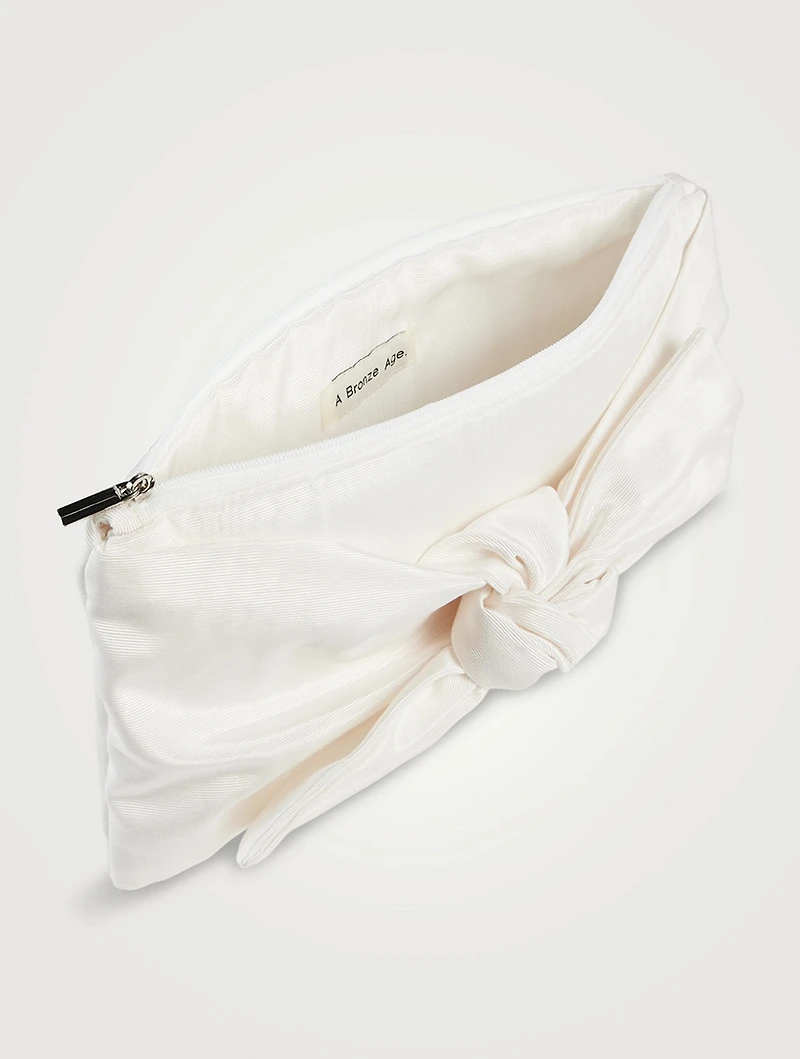 Bow Moiré Clutch