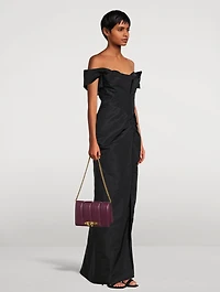 The Slash Four-Ring Leather Clutch