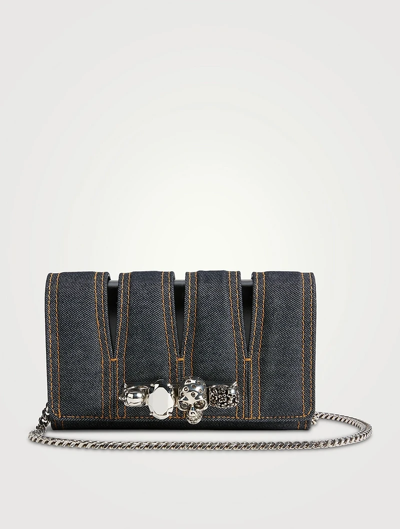 The Slash Four-Ring Denim Clutch