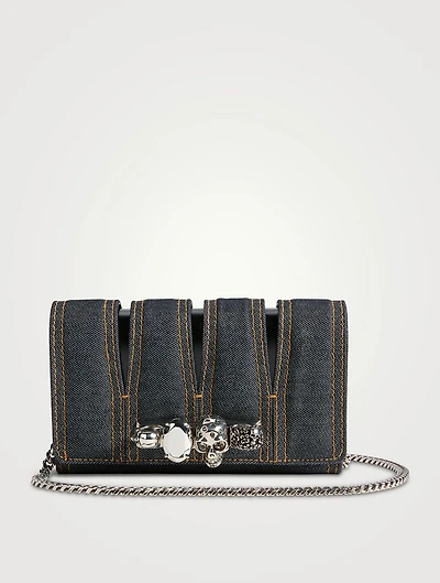 The Slash Four-Ring Denim Clutch