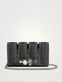 The Slash Four-Ring Denim Clutch