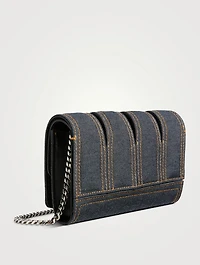 The Slash Four-Ring Denim Clutch