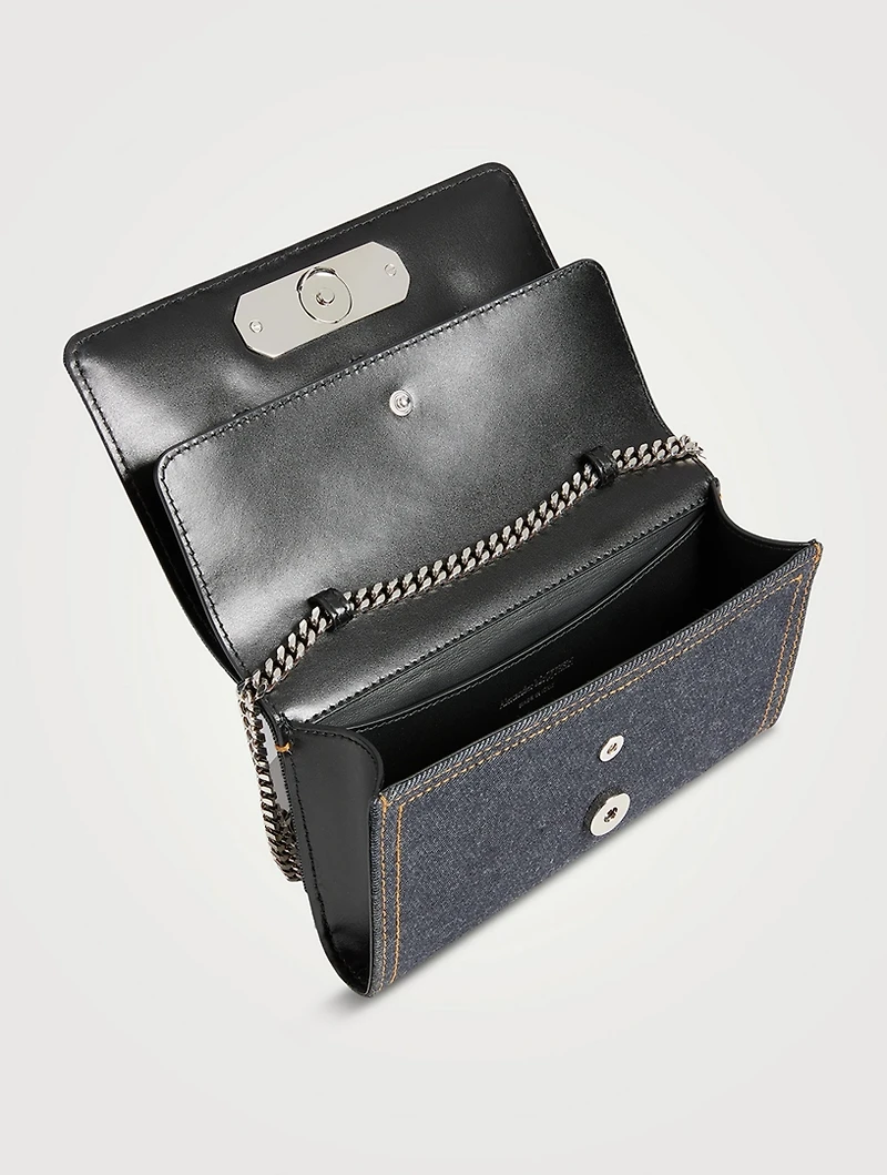 The Slash Four-Ring Denim Clutch