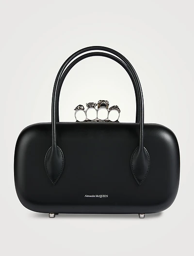 The Reverse Leather Clutch