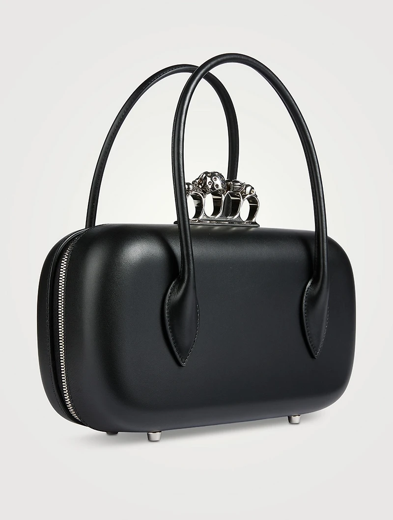 The Reverse Leather Clutch