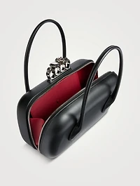 The Reverse Leather Clutch