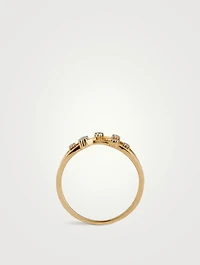 Gold Intertwined Ring With Gems