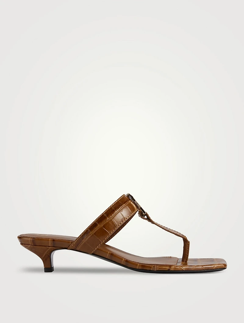 The Belted Croc-Embossed Leather Thong Mules