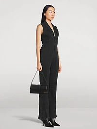 CRVY Ring The Alarm Denim Jumpsuit