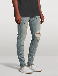 P002 Mid-Rise Slim Jeans