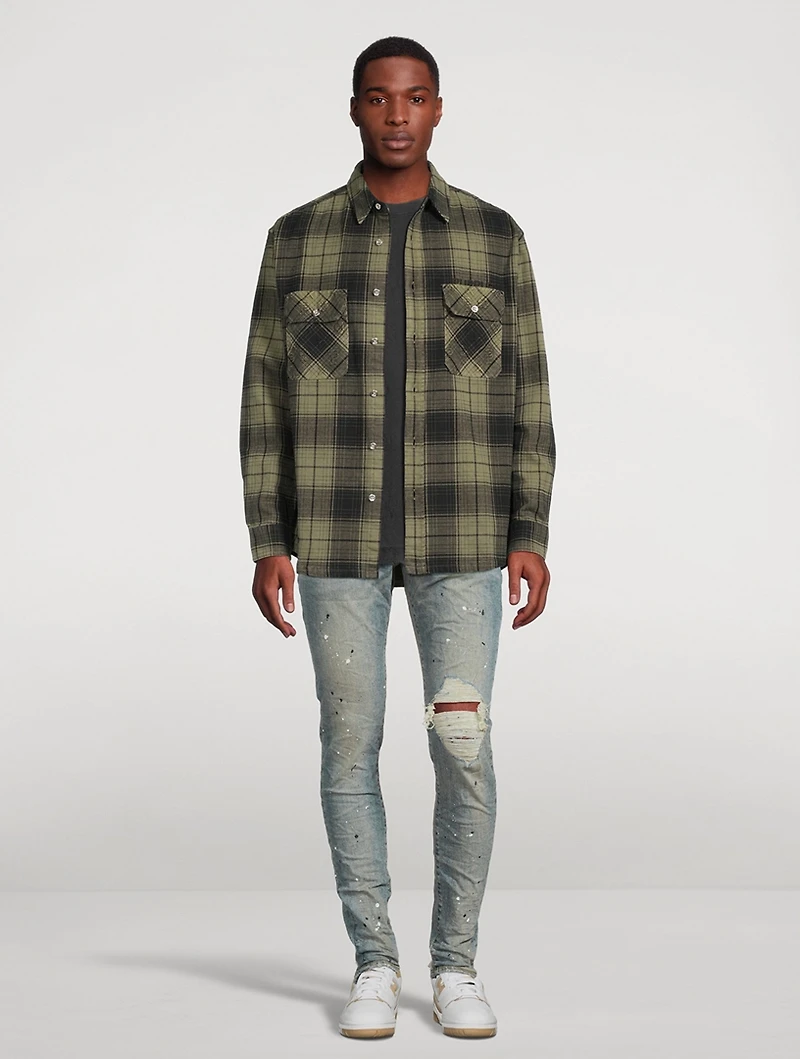 P002 Mid-Rise Slim Jeans