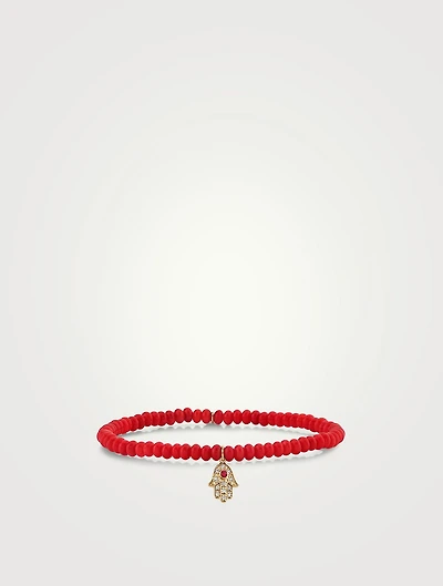 Coral Beaded Bracelet With Gold Ruby And Diamond Hamsa Charm