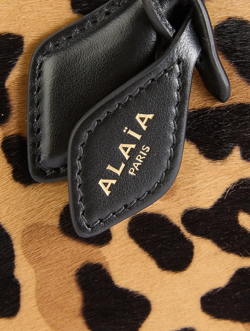 Le Teckel Calf Hair Clutch In Leopard Print
