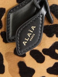 Le Teckel Calf Hair Clutch In Leopard Print