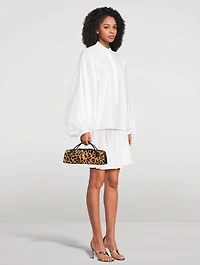 Le Teckel Calf Hair Clutch In Leopard Print