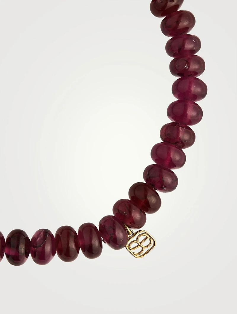 Rhodolite Beaded Bracelet With 14K Gold Diamond Wheel Rondelle