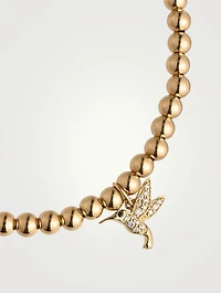 14K Gold Beaded Bracelet With Small 14K Diamond Hummingbird Charm