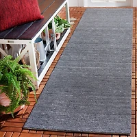 SAFAVIEH Outdoor Micro-Loop Garrett Solid Indoor/Outdoor Area Rug