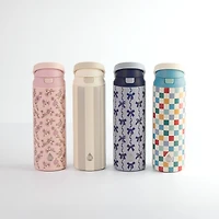 TAL Stainless Steel 2-in-1 Straw and Chug Water Bottle with Push Lid 24 fl oz, Blue Bows