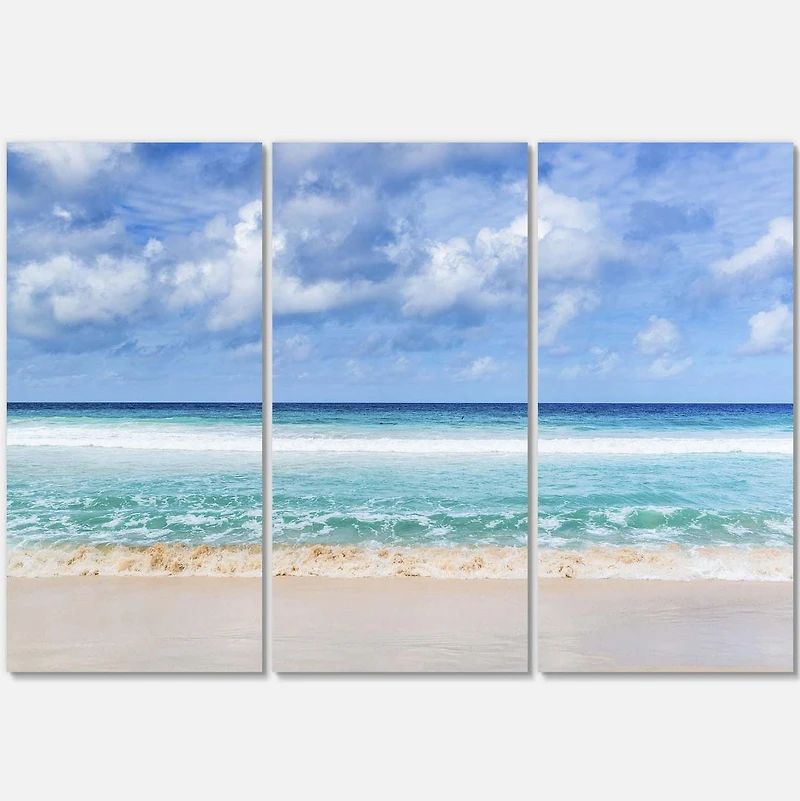 Designart Tranquil Beach under White Clouds Canvas Wall Art